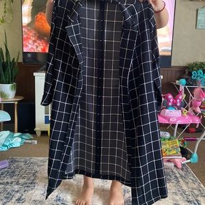 Black blazer with white lines